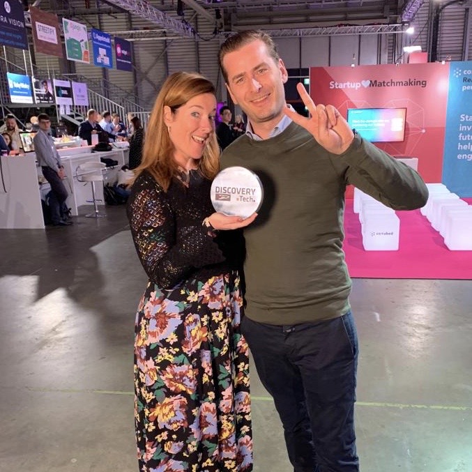 Sophie and Philippe receiving the Discovery Tech award